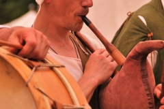 minstrel playing medieval bagpipes